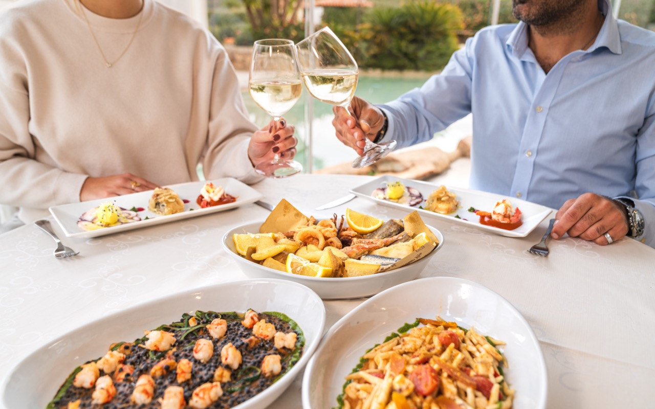 Shared seafood lunch by the pool