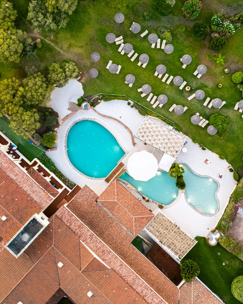 Aerial drone view Hotel Sa Pedra pool and gardens